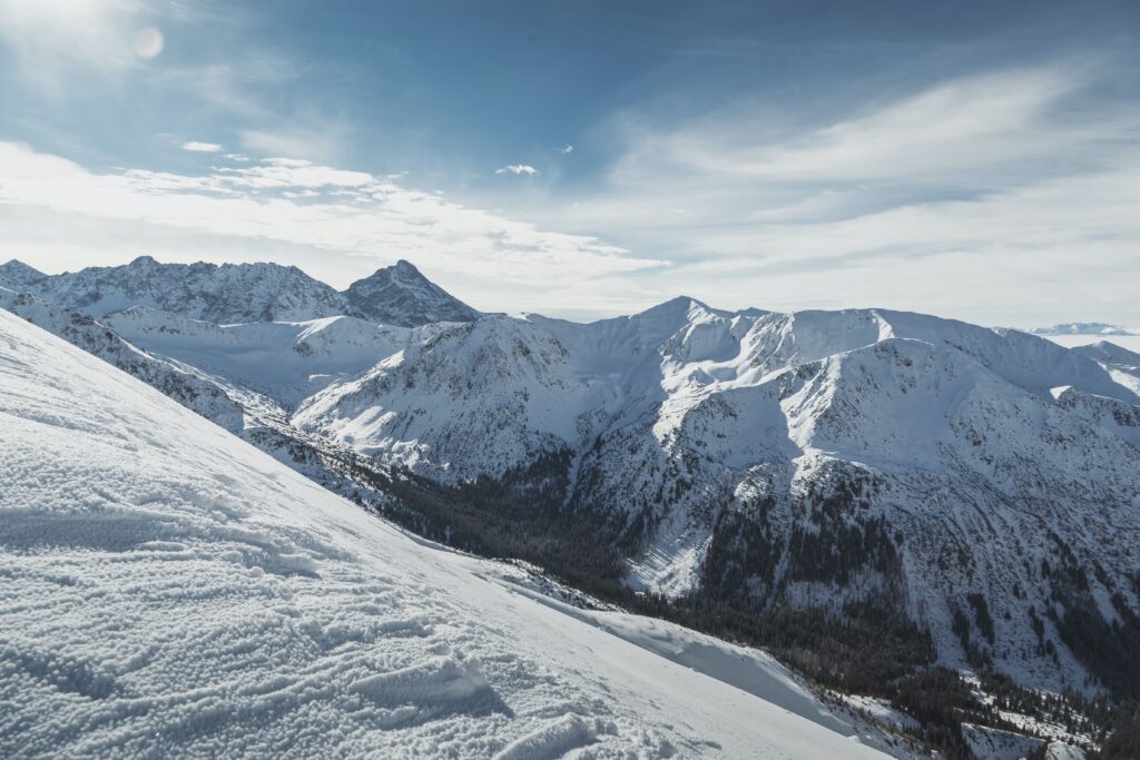 Wide view of the snowy peaks of the Tatry mountains on the border of Poland and Slovakia.
